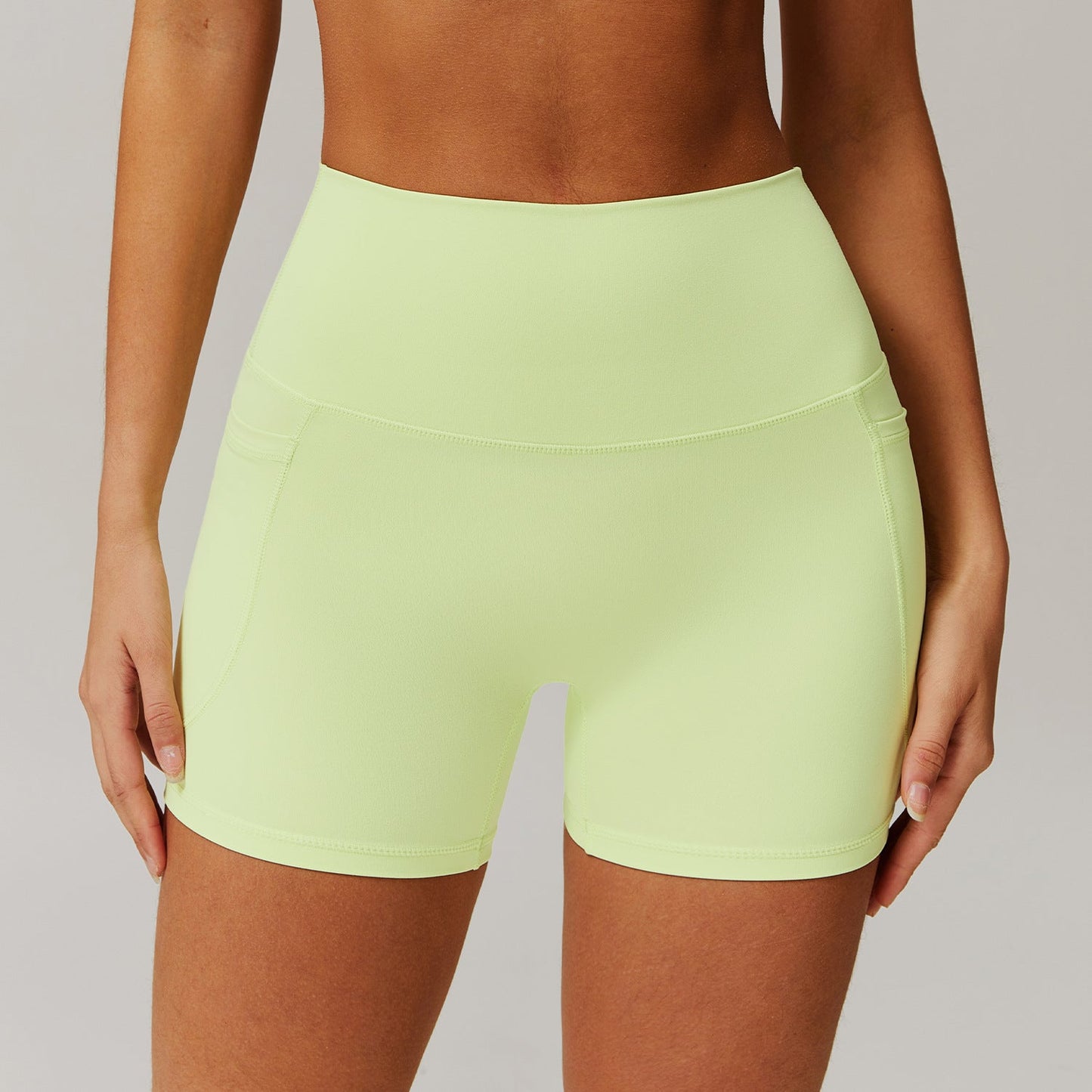 Women's new quick-drying nude sports inclined one-shoulder back yoga bra+pocket breathable fitness shorts