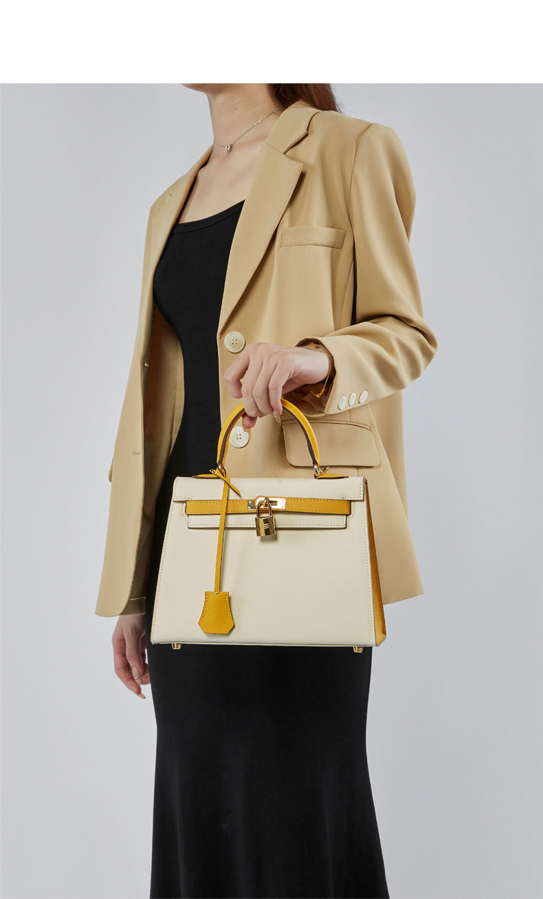 Women's New Leather Color Matching Design Palm Print Shoulder Messenger Bag Fashion Joker Handbag.