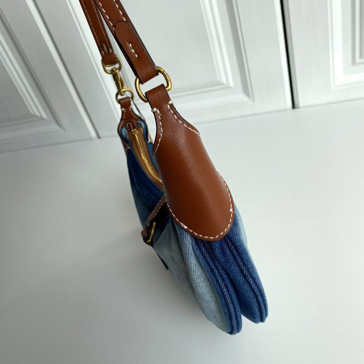 Women's new Joker embroidered denim leather portable daily shoulder bag.